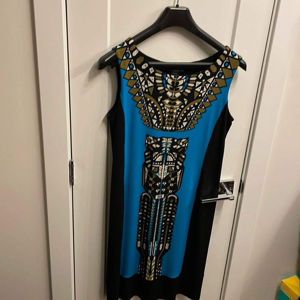 Ladies spandex patterned midi dress. Size L